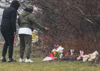 Mother of 2 girls found in shallow graves in Cleveland charged with murder