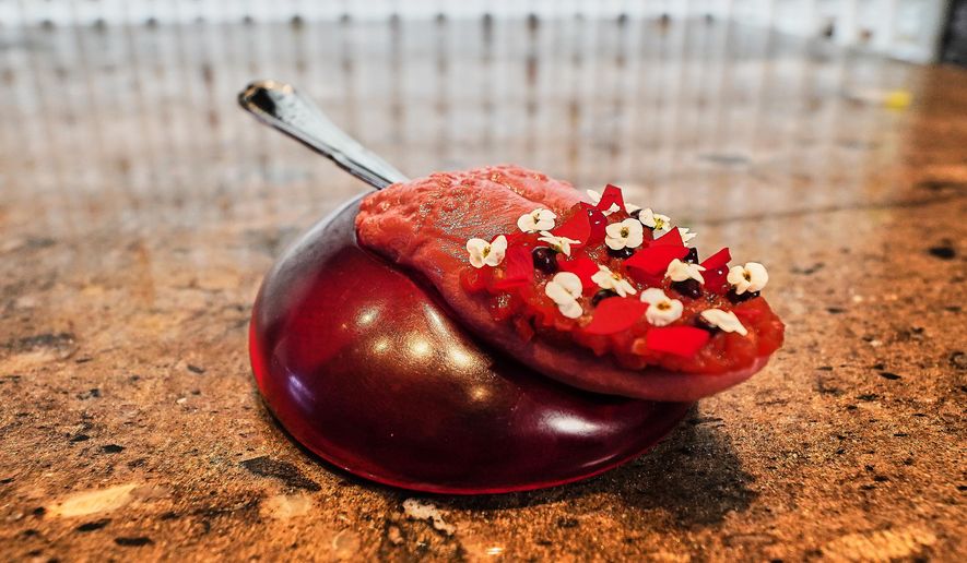 A dish named "Tongue Kiss" served at restaurant Alchemist in Copenhagen, Denmark, Feb. 11, 2026. (AP Photo/James Brooks)