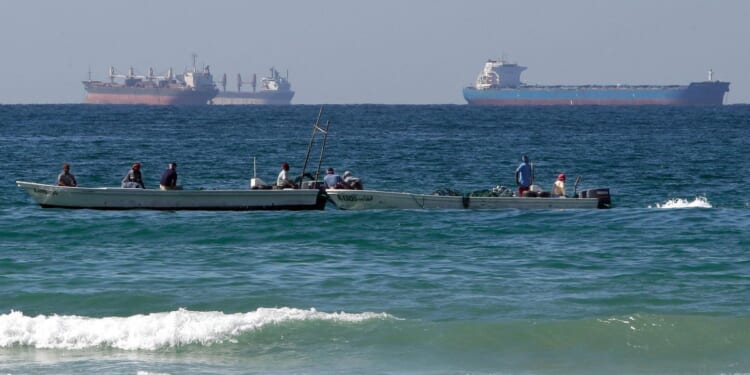 Oil tanker clears Strait of Hormuz, Trump’s energy secretary says, as gas prices surge