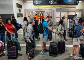 Long airport lines highlight concerns about unpaid security officers in the shutdown