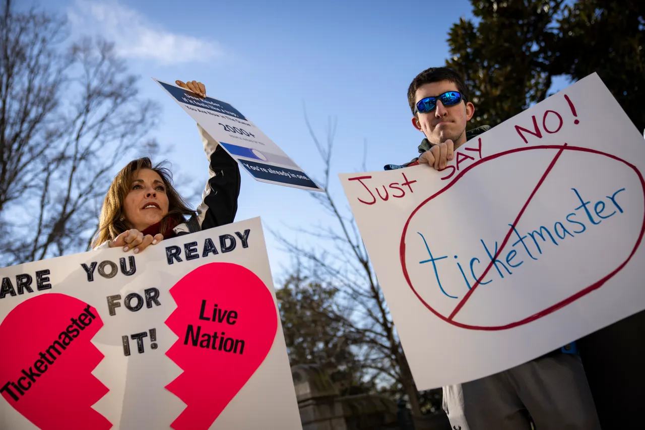 WASHINGTON, DC - JANUARY 24: Penny Harrison and her son Parker Harrison rally against the live entertainment ticket industry outside the U.S. Capitol January 24, 2023 in Washington, DC. The Senate Judiciary Committee is holding a hearing this morning to explore whether the merger of Live Nation and Ticketmaster has stifled competition and harmed the consumer marketplace. (Photo by Drew Angerer/Getty Images)