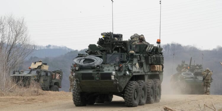 North Korea fires about 10 missiles toward sea in show of force, Seoul says