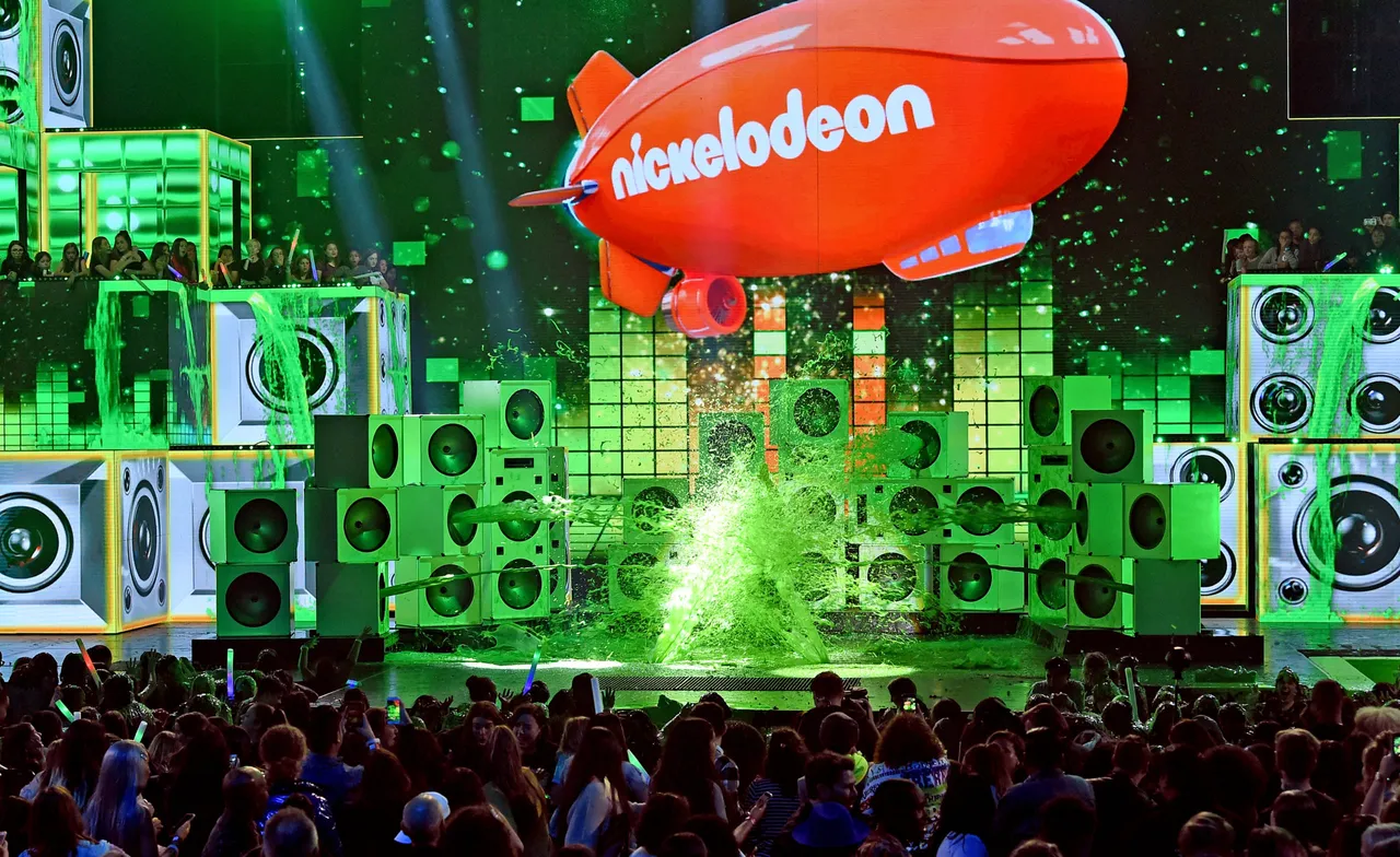 LOS ANGELES, CA - MARCH 23: DJ Khaled gets slimed onstage at Nickelodeon's 2019 Kids' Choice Awards at Galen Center on March 23, 2019 in Los Angeles, California. (Photo by Kevin Winter/Getty Images)