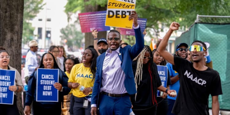 Americans are defaulting on their loans at a record rate