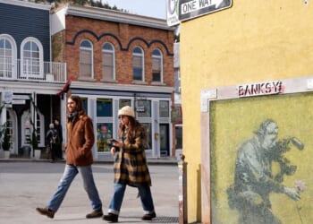 The media may have unmasked Banksy — again. That’s angered some art fans but not ruffled dealers