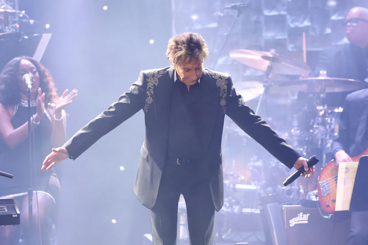 US singer-songwriter Barry Manilow bows after performing during the Recording Academy and Clive Davis' Salute To Industry Icons 50-Year Anniversary of the pre-Grammy gala at the Beverly Hilton hotel in Beverly Hills, California, on February 1, 2025. (Photo by Michael Tran / AFP via Getty Images)