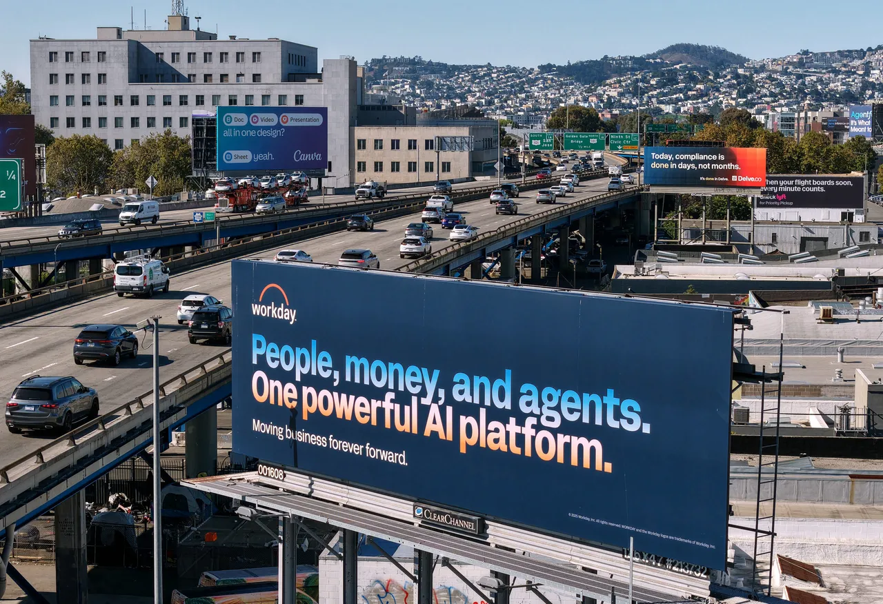 In an aerial view, a billboard advertising an artificial intelligence (AI) company is posted on September 16, 2025 in San Francisco, California. (Photo by Justin Sullivan/Getty Images)