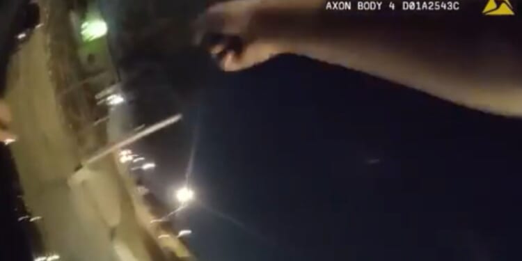 Daredevil Cop Hitches a Ride on the Hood of a Car During Pursuit [WATCH]