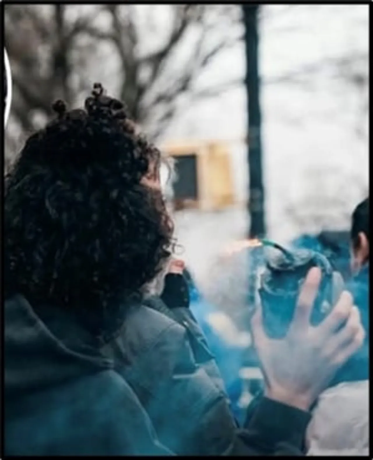 Emir Balat holds an improvised explosive device. - Courtesy of the Department of Justice