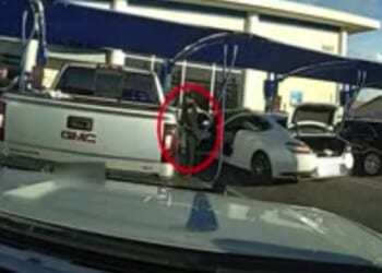 Stolen Truck Driver Nearly Crushes Cop, Rams Cruiser During Wild Car Wash Escape [WATCH]