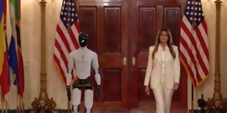Watch Surreal Scene As Robot That Walks Like Joe Biden Disappears Behind Melania