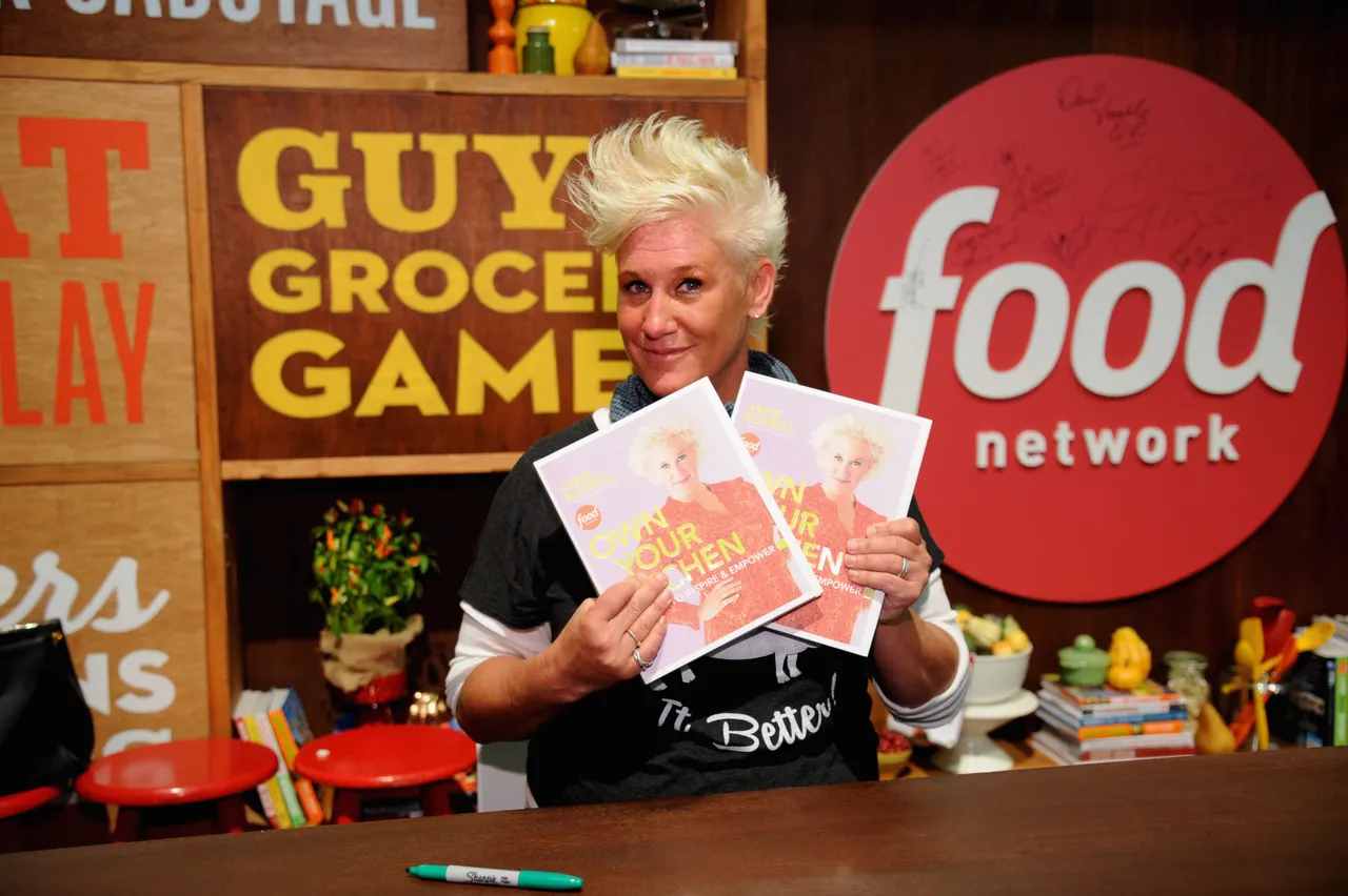 NEW YORK, NY - OCTOBER 19: Chef Anne Burrell poses with her book 