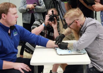 Are companies microchipping their workers? Yes — and states are cracking down