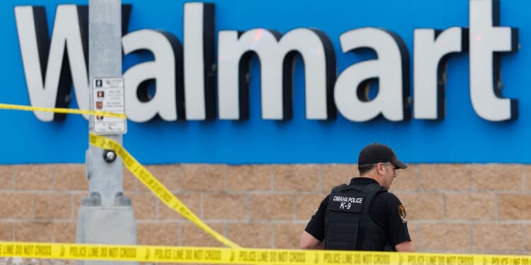 Omaha, Nebraska, police fatally shoot a woman who grabs a child and slashes him with a knife