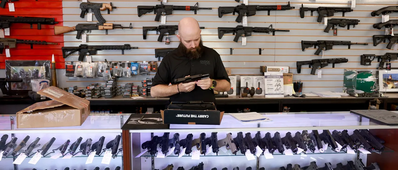Ian Bravender inventories a handgun