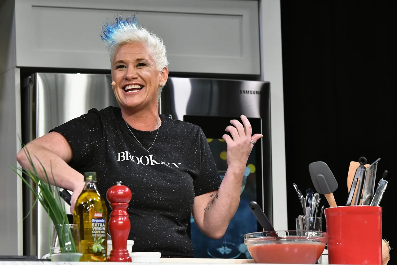 NEW YORK, NY - OCTOBER 14: Chef Anne Burrell prepares a dish at the Food Network & Cooking Channel New York City Wine & Food Festival presented by Coca-Cola - Grand Tasting presented by ShopRite featuring Samsung® culinary demonstrations presented by Mastercard at Pier 94 on October 14, 2017 in New York City. (Photo by Gustavo Caballero/Getty Images for NYCWFF)