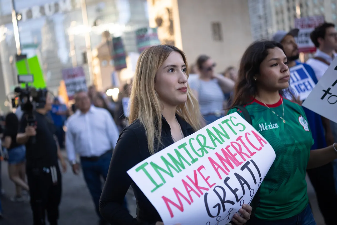 CHICAGO, ILLINOIS - SEPTEMBER 30: Demonstrators protest the Trump administration with a march through downtown on September 30, 2025 in Chicago, Illinois. The protest was organized on the heels of ICE raids in the city, including a raid on a apartment building early that morning that involved a reported 300 federal agents. (Photo by Scott Olson/Getty Images)