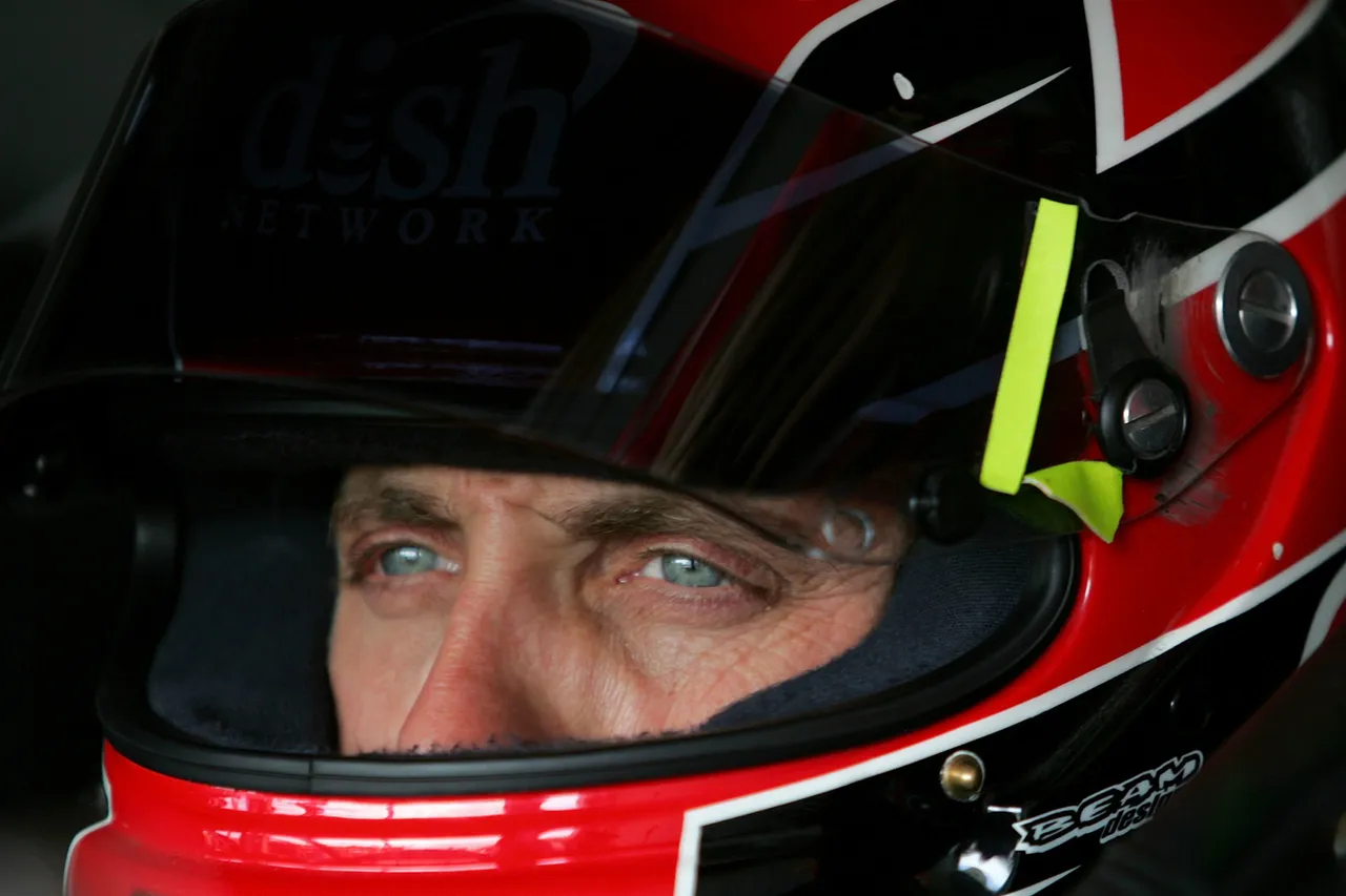 HOMESTEAD, FL - NOVEMBER 17: Greg Biffle, driver of the #16 Dish Network Ford, sits in his car during practice for the NASCAR Nextel Cup Series Ford 400 at Homestead-Miami Speedway on November 17, 2007 in Homestead, Florida. (Photo by Todd Warshaw/Getty Images for NASCAR)