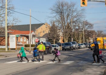 Hero Crossing Guard Pulls Child From Crash, Goes Viral While Eating Ice Cream, Praising Jesus [WATCH]